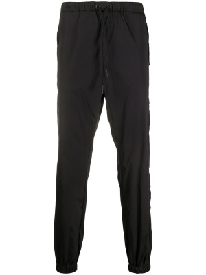 

Cross tapered track pants, Marcelo Burlon County of Milan Cross tapered track pants