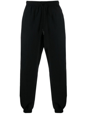 

Logo-patch track pants, Marcelo Burlon County of Milan Logo-patch track pants