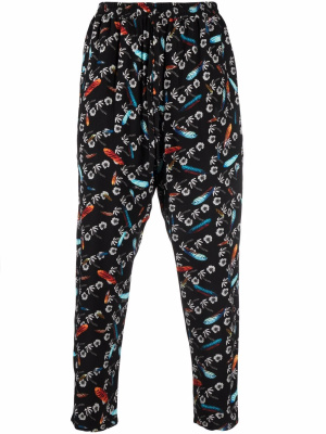 

Graphic-print pleated track pants, Marcelo Burlon County of Milan Graphic-print pleated track pants