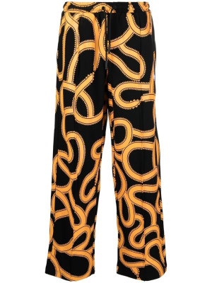 

Snake-print track pants, Marcelo Burlon County of Milan Snake-print track pants