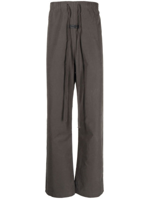 

Logo-patch straight-leg trousers, FEAR OF GOD ESSENTIALS Logo-patch straight-leg trousers