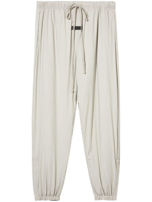 

Tapered-leg drop crotch trousers, FEAR OF GOD ESSENTIALS Tapered-leg drop crotch trousers