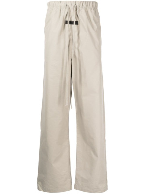 

Logo-patch straight-leg trousers, FEAR OF GOD ESSENTIALS Logo-patch straight-leg trousers