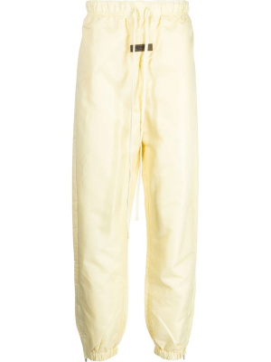

Logo-patch track pants, FEAR OF GOD ESSENTIALS Logo-patch track pants