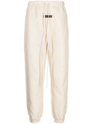 

Logo-tag drawstring track pants, FEAR OF GOD ESSENTIALS Logo-tag drawstring track pants