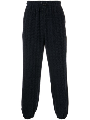 

Monogram-embossed drawstring track pants, Alexander Wang Monogram-embossed drawstring track pants