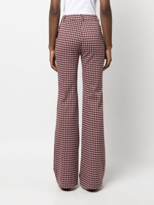 

Graphic-print flared trousers, Moschino Graphic-print flared trousers