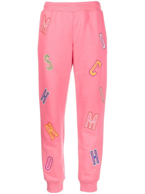 

Logo-lettering track pants, Moschino Logo-lettering track pants