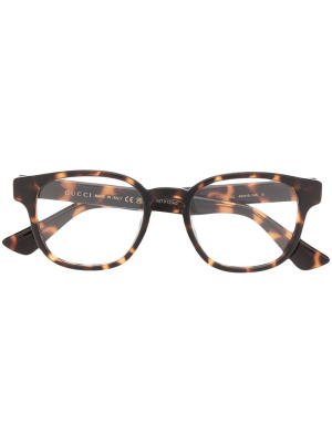 

Round-frame logo glasses, Gucci Eyewear Round-frame logo glasses