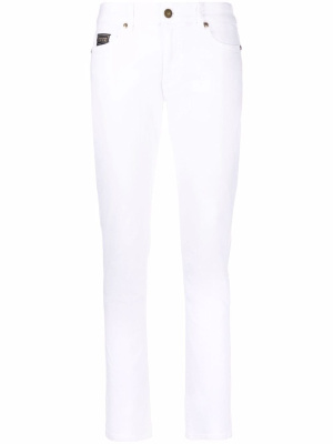 

Logo-embroidered skinny trousers, Versace Jeans Couture Logo-embroidered skinny trousers