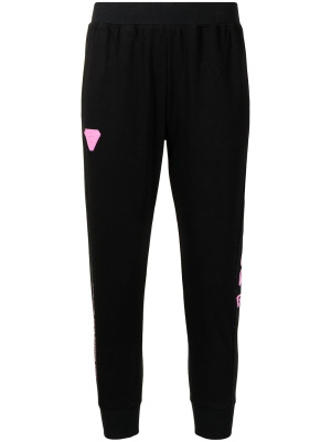 

Logo-print cropped track pants, AAPE BY *A BATHING APE® Logo-print cropped track pants