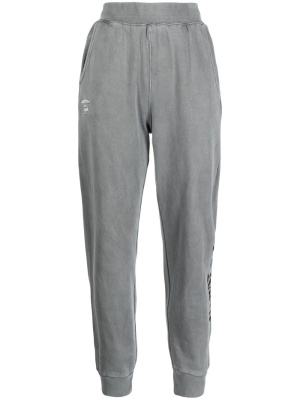 

Logo-print track pants, AAPE BY *A BATHING APE® Logo-print track pants
