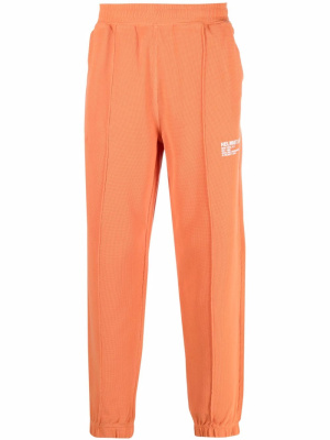 

Logo-print tapered joggers, Helmut Lang Logo-print tapered joggers