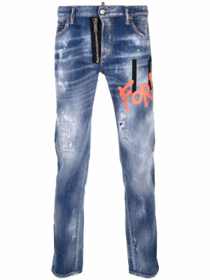 

Graffiti-print distressed jeans, Dsquared2 Graffiti-print distressed jeans