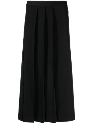 

Pleated-skirt wrap-design trousers, Yohji Yamamoto Pleated-skirt wrap-design trousers