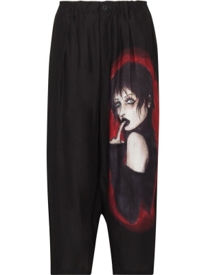 

Graphic-print cropped silk trousers, Yohji Yamamoto Graphic-print cropped silk trousers