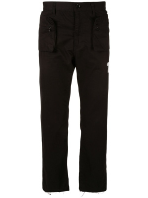 

Zipped pockets trousers, Undercover Zipped pockets trousers