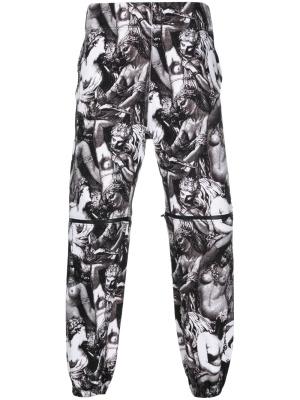 

Graphic-print track pants, Undercover Graphic-print track pants