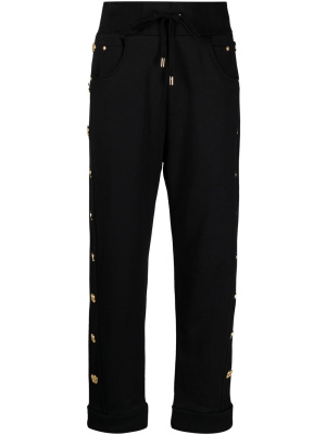 

Logo button trim track pants, Balmain Logo button trim track pants