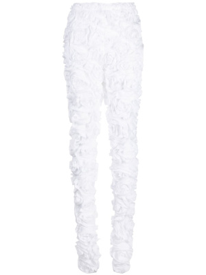 

Floral-appliqué textured-finish trousers, Comme Des Garçons Floral-appliqué textured-finish trousers