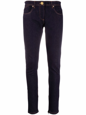 

Patchwork slim-fit jeans, Versace Patchwork slim-fit jeans