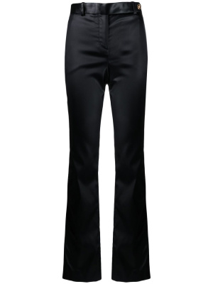 

Flared low-rise trousers, Versace Flared low-rise trousers