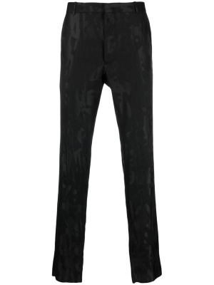 

Graffiti jacquard-logo tailored trousers, Alexander McQueen Graffiti jacquard-logo tailored trousers