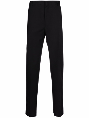 

Pressed-crease tailored trousers, Alexander McQueen Pressed-crease tailored trousers