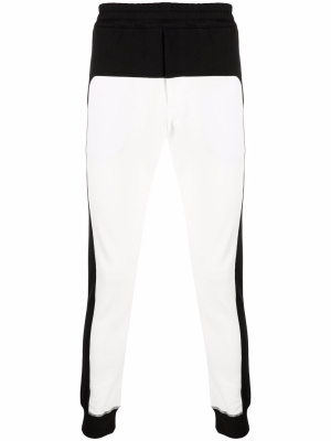 

Panelled cotton track pants, Alexander McQueen Panelled cotton track pants