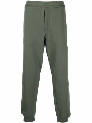 

Slim-fit cotton track pants, Alexander McQueen Slim-fit cotton track pants