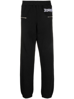 

Logo-print track pants, Moschino Logo-print track pants