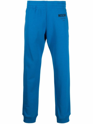 

Logo-print track pants, Moschino Logo-print track pants