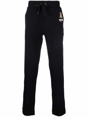 

Underbear logo-print joggers, Moschino Underbear logo-print joggers