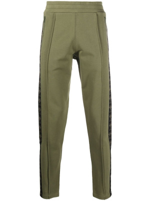 

Logo-print cotton track trousers, Moschino Logo-print cotton track trousers
