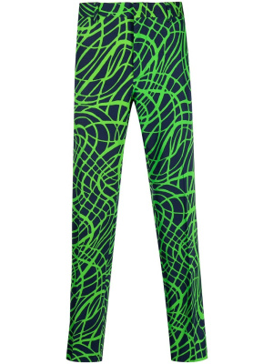 

Graphic-print tapered trousers, Moschino Graphic-print tapered trousers