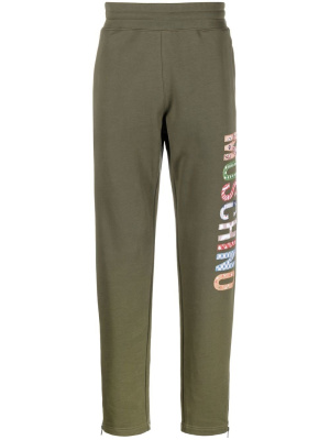 

Logo-print track pants, Moschino Logo-print track pants