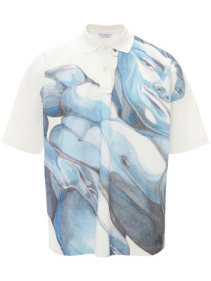 

Graphic-print short-sleeved polo shirt, JW Anderson Graphic-print short-sleeved polo shirt