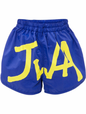 

Logo-print swim shorts, JW Anderson Logo-print swim shorts