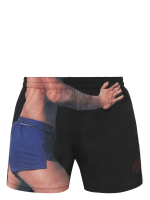 

Photograph-print swim shorts, JW Anderson Photograph-print swim shorts