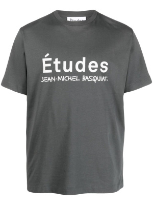 

X Jean Michel Baquiat logo-print T-shirt, Etudes X Jean Michel Baquiat logo-print T-shirt
