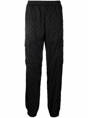 

Monogram-print trousers, MISBHV Monogram-print trousers