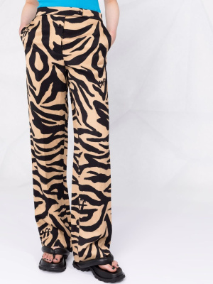 

Zebra and logo-print trousers, Off-White Zebra and logo-print trousers