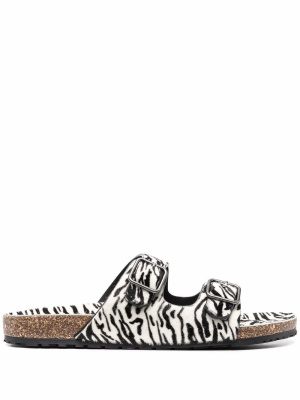

Zebra-print slides, Saint Laurent Zebra-print slides