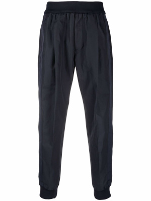 

Tapered elasticated trousers, Alexander McQueen Tapered elasticated trousers