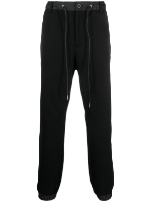 

Drawstring-waist cotton track trousers, Sacai Drawstring-waist cotton track trousers