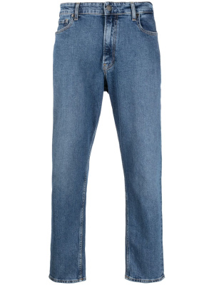 

Logo-patch mid-rise tapered jeans, Calvin Klein Logo-patch mid-rise tapered jeans