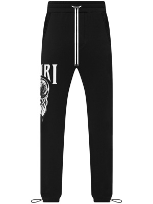 

Graphic-print cotton track pants, AMIRI Graphic-print cotton track pants