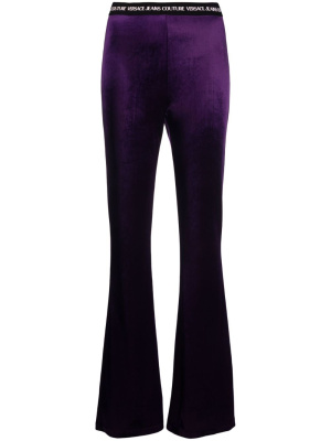 

Logo-waistband velvet flared trousers, Versace Jeans Couture Logo-waistband velvet flared trousers