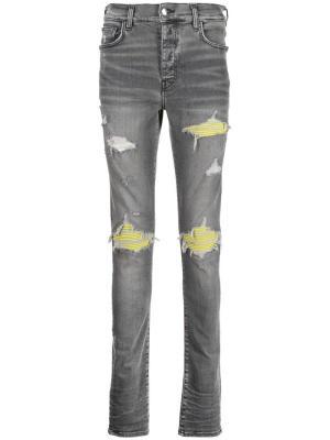 

Mid-rise ripped skinny jeans, AMIRI Mid-rise ripped skinny jeans