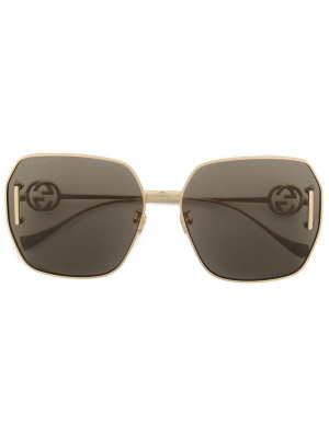 

Rimless logo plaque sunglasses, Gucci Eyewear Rimless logo plaque sunglasses